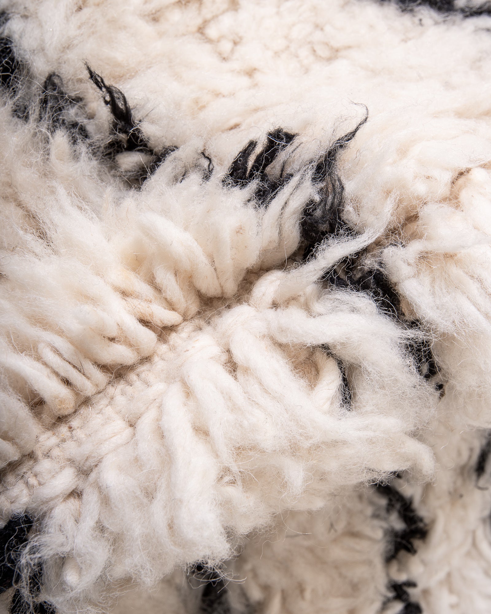 Modern, designer, handcrafted Berber rug from Morocco. Beniourain carpet with beautiful colours and patterns and fluffy wool texture.